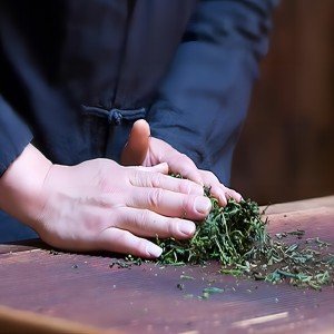 image of processing and producing jin jun mei by hand