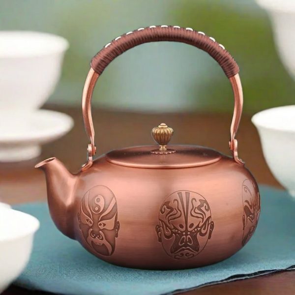 Antique Facial Masks Theme Handcrafted Copper Teapot For Sale